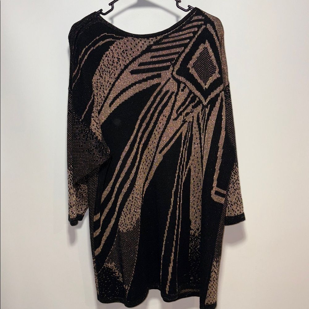 Vintage sweater with a black and sparkling gold pattern